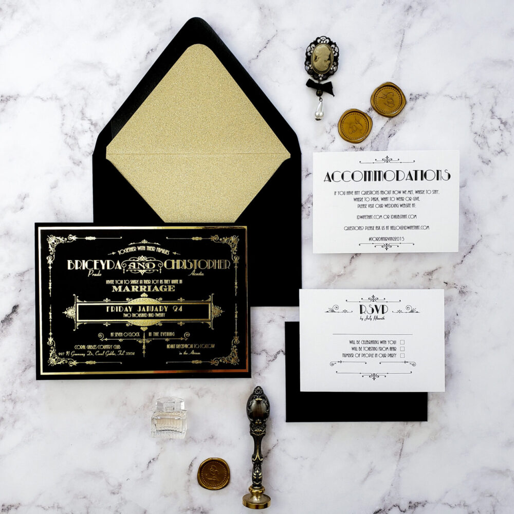 art deco style black and gold wedding invitations with gold wax seal