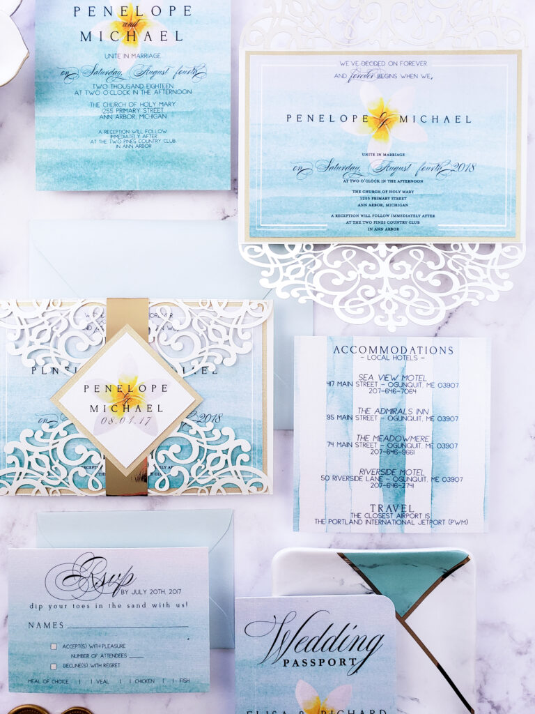 tropical wedding invitation in sky blue white and gold