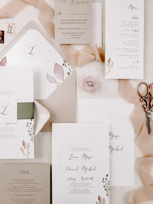 pink themed stationery and ring