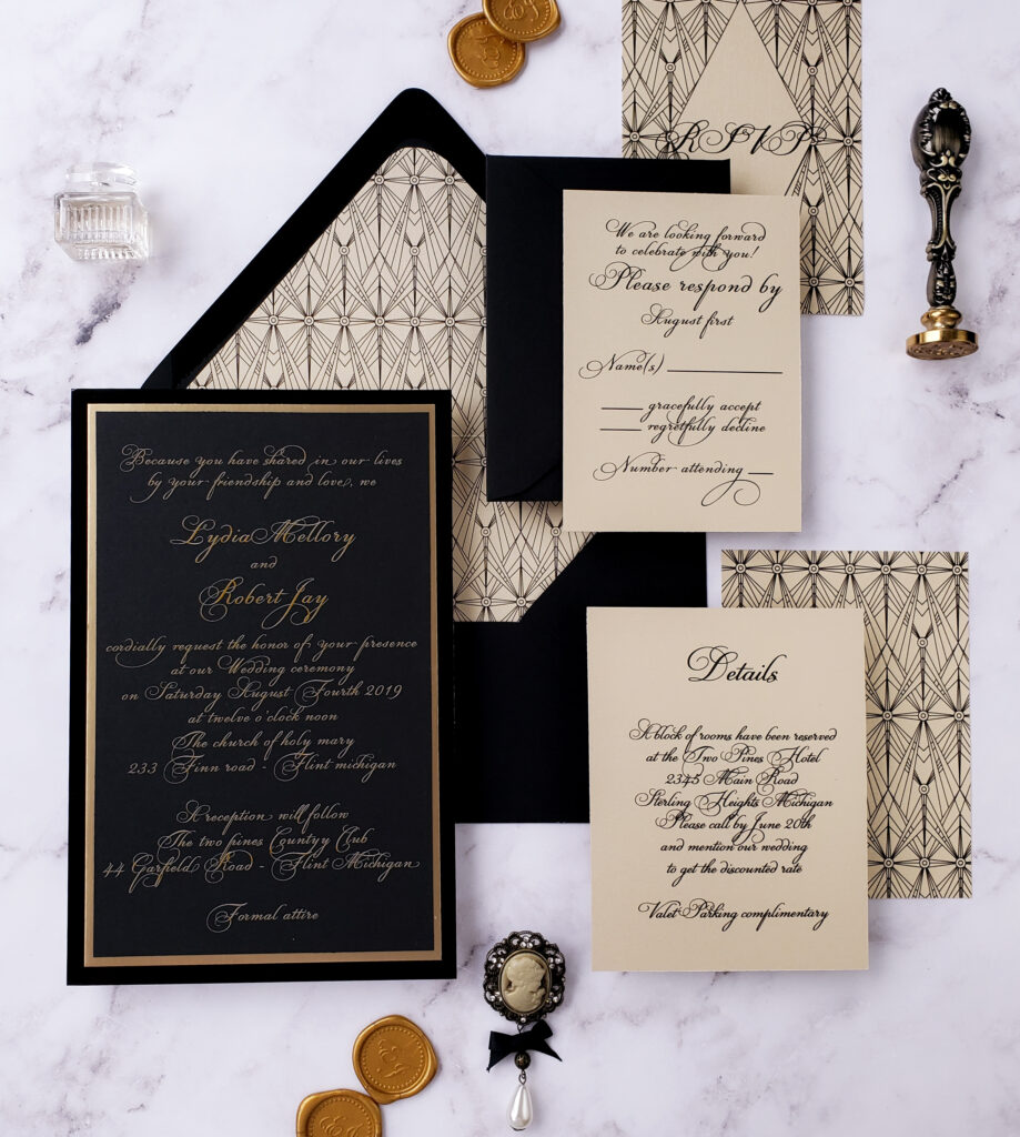 black cream and gold stationery set with vintage wax stamps