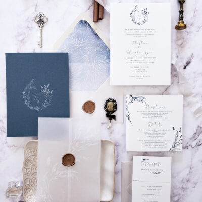 dusty blue vellum wedding invitation suite