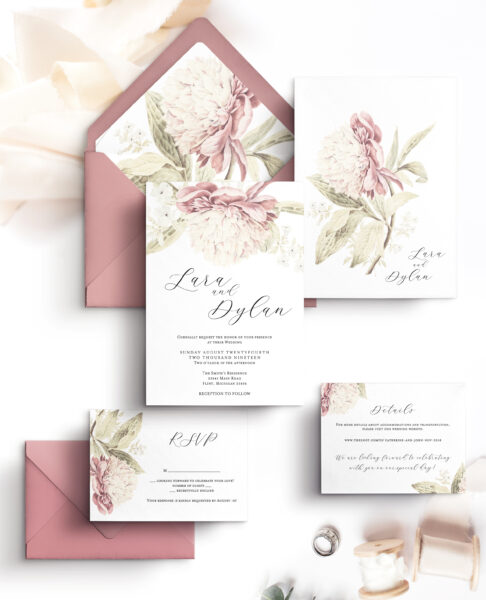 pink envelopes and white stationery with flowers