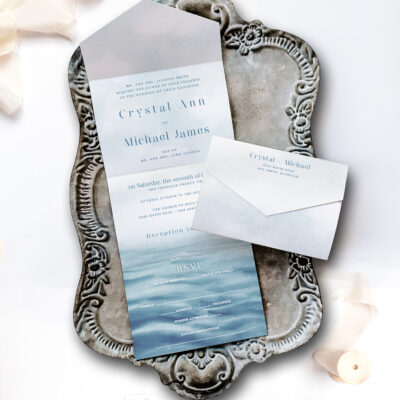 nice wedding invitation on tray water inspired