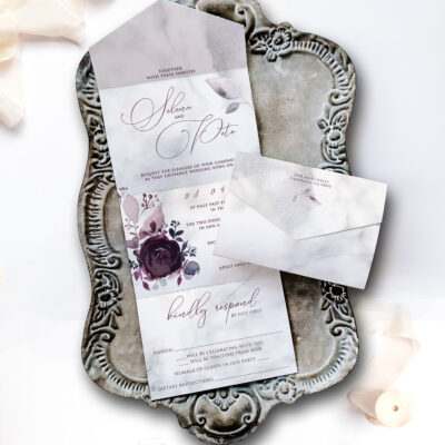 rome wedding invitation on tray