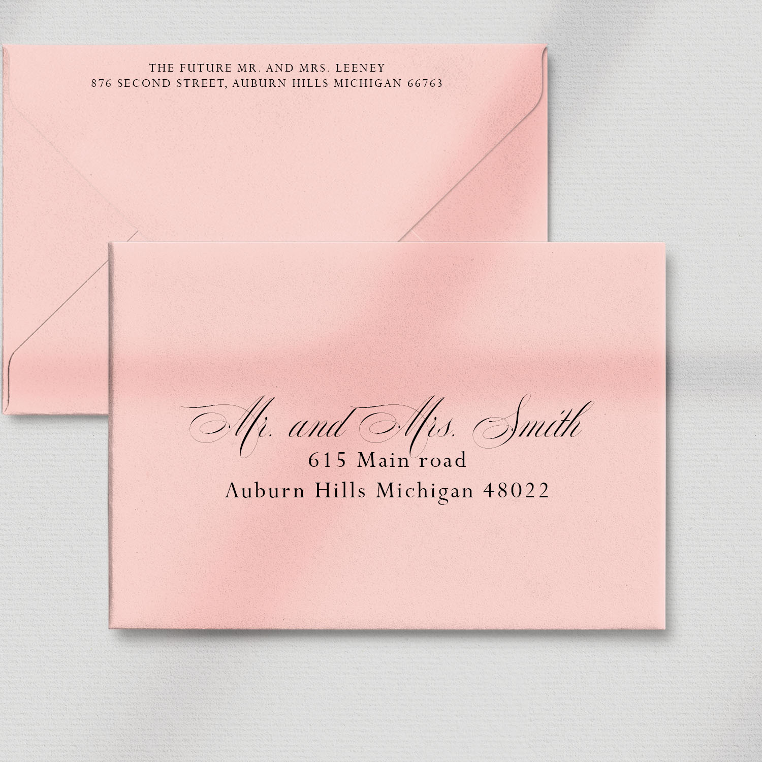 pink envelope with name and address