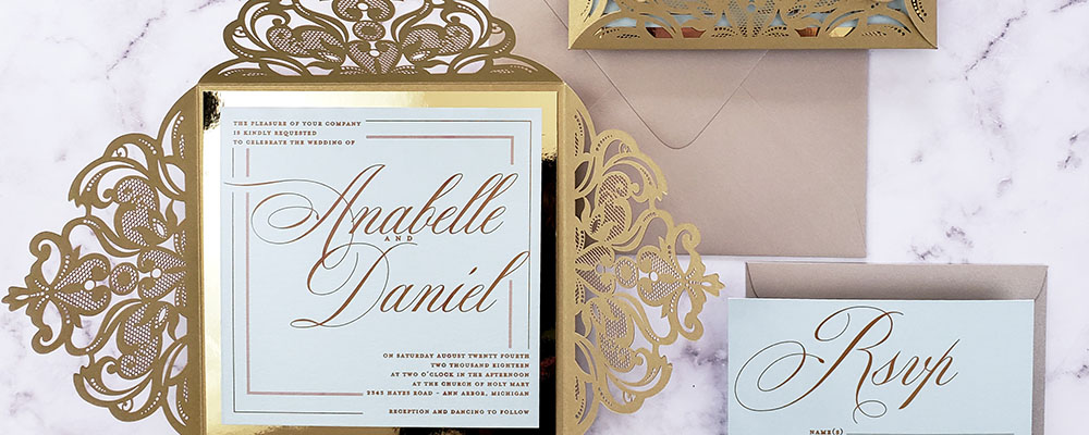 Anabelle Daniel invitation with gold edges and lace design