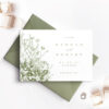 save the date card with green envelope and flowers