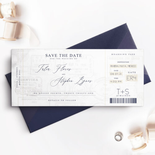 dark blue envelope with travel inspired save the date card