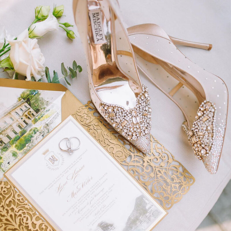Luxury Lake Como wedding invitation suite with a gold laser-cut gatefold, custom watercolor envelope liner, and event cards for a multi-day destination celebration.