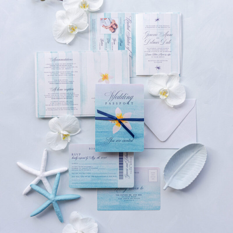tropical destination wedding invitation passport with plumeria flower