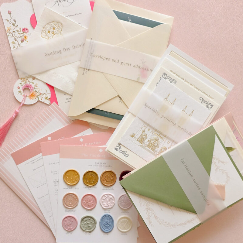 Luxury wedding invitation sample pack by Designed with Amore, featuring curated invitation suites, specialty papers, elegant envelopes, and custom stationery details.