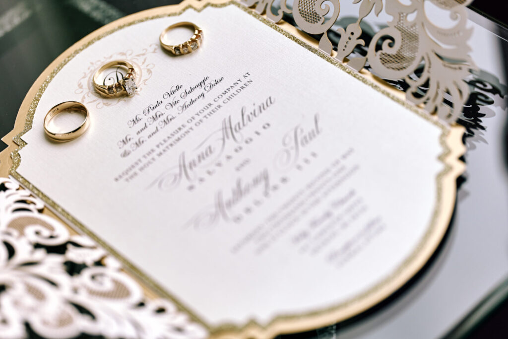 Close-up of wedding invitation wording, showcasing essential information