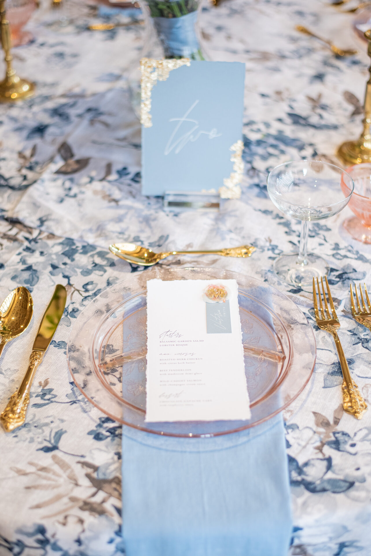 Styled wedding photoshoot at The Treasury in Michigan, featuring a vintage dusty blue and gold wedding theme with romantic elements and classic architecture