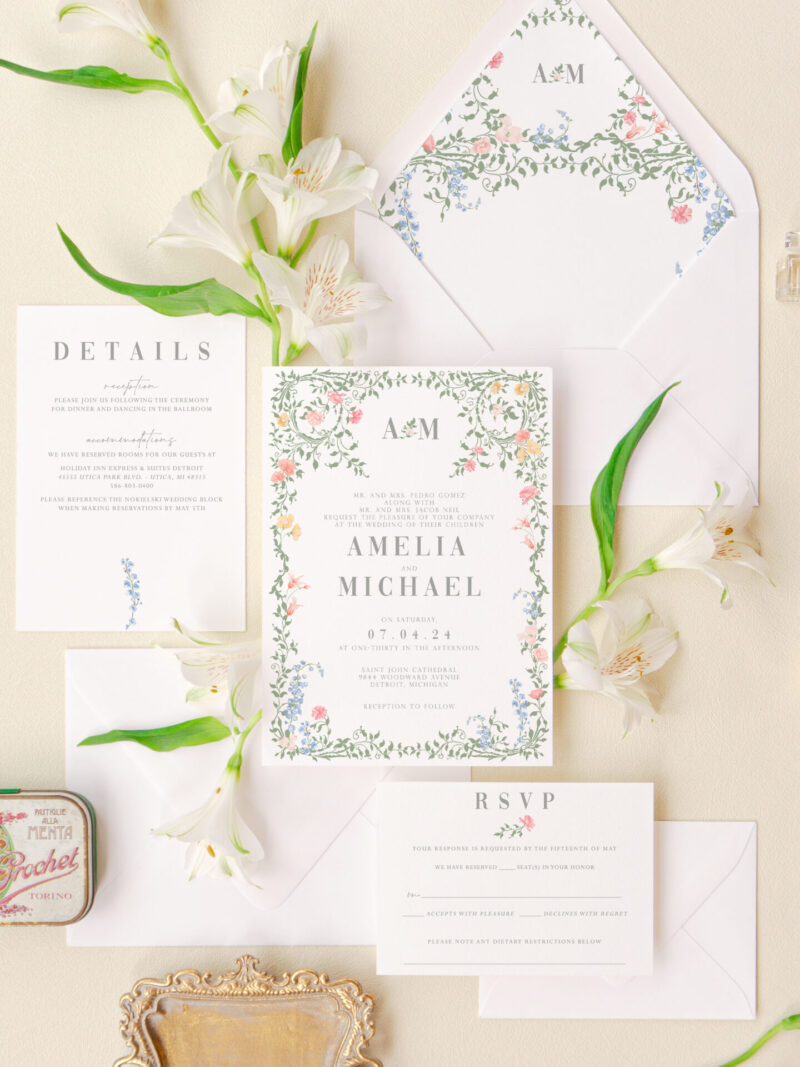 Charming floral wedding stationery featuring pastel hues and illustrated designs