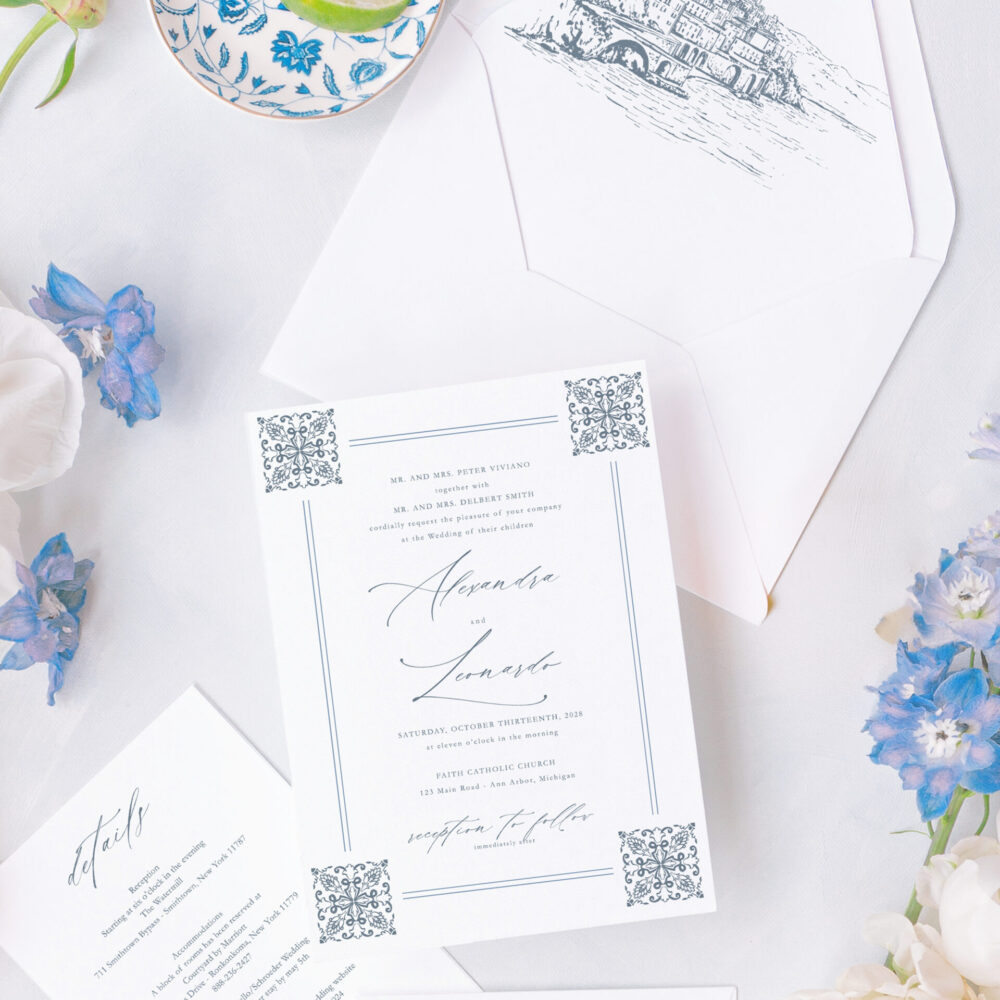 Elegant Amalfi Coast wedding invitation suite with Mediterranean tile patterns and Positano-inspired details.