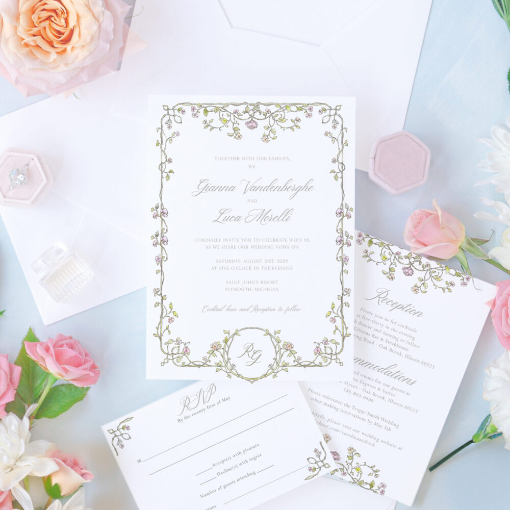 Romantic floral wedding invitation suite with garden-inspired details and envelope liner.