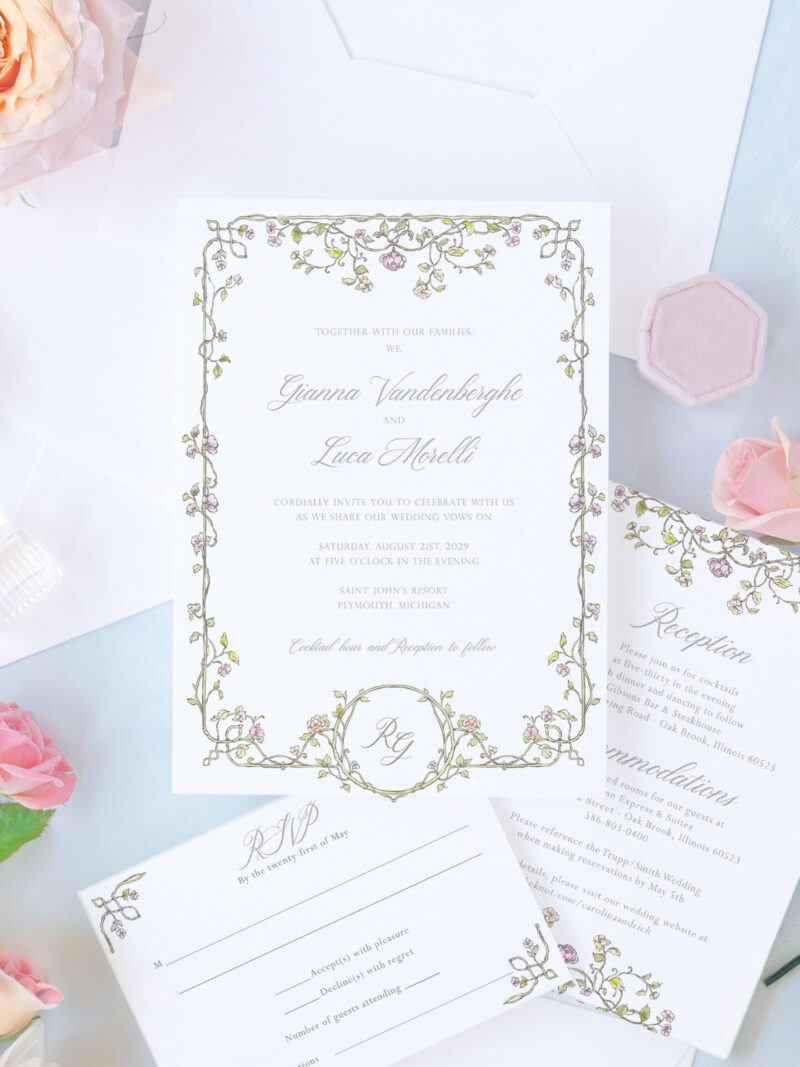 Romantic floral wedding invitation suite with garden-inspired details and envelope liner.