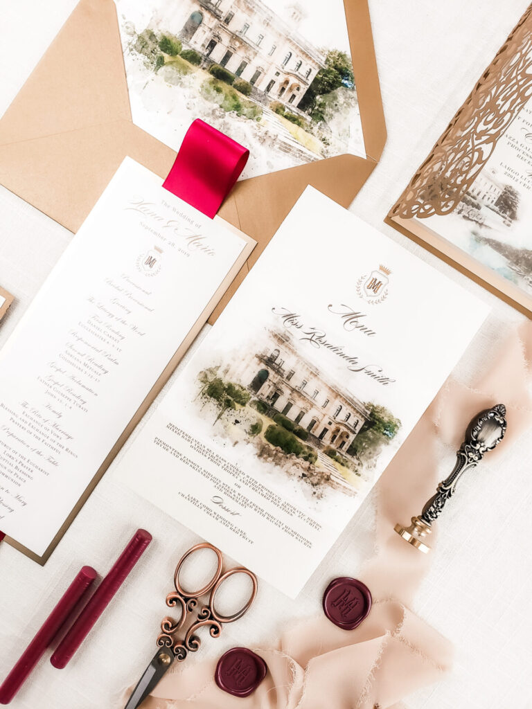 Burgundy wax seals, velvet ribbons, and gold filigree details complementing an elegant wedding invitation suite for a destination wedding in Italy.