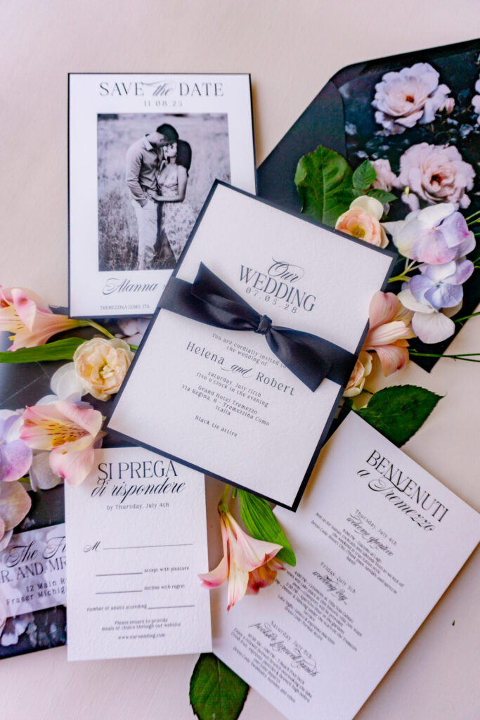 Wedding invitation envelope with moody floral liner and satin ribbon, designed for an Italian destination wedding