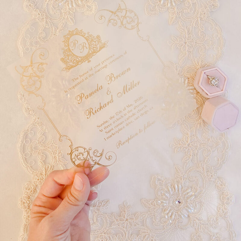 Clear Plexiglass invitation suite, acrylic and gold ink