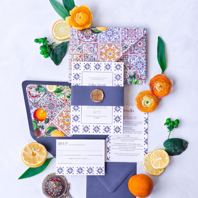Italian tile wedding invitation suite with blue and white Mediterranean patterns