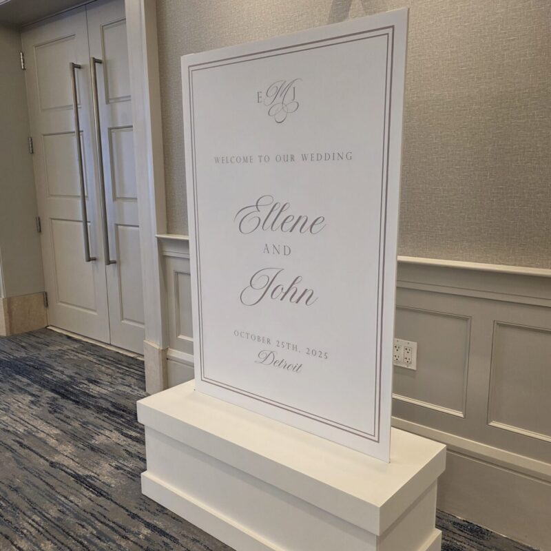 Modern elegant welcome sign on custom pedestal