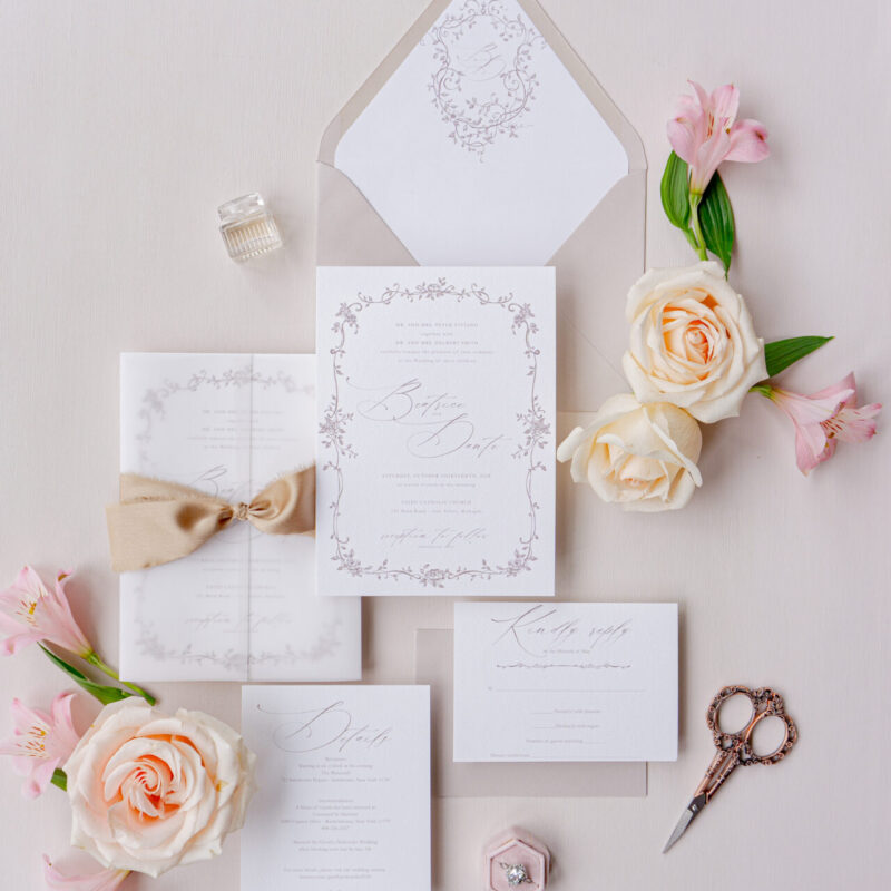romantic wedding invitation with vellum wrap and ribbon