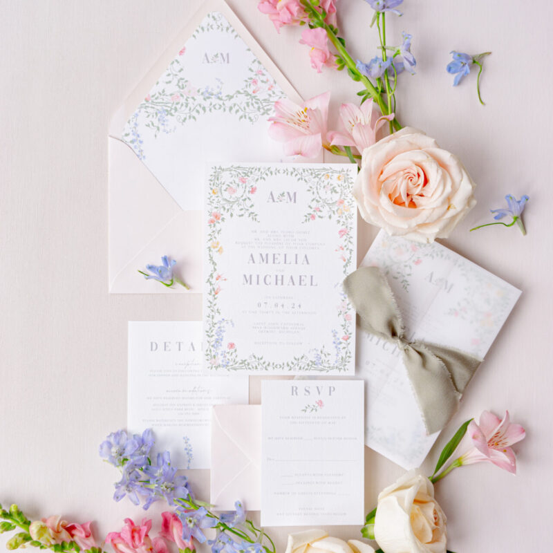 pastel floral wedding invitation suite with botanical details