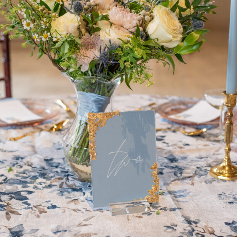 Torn edge table number with gold foil accents